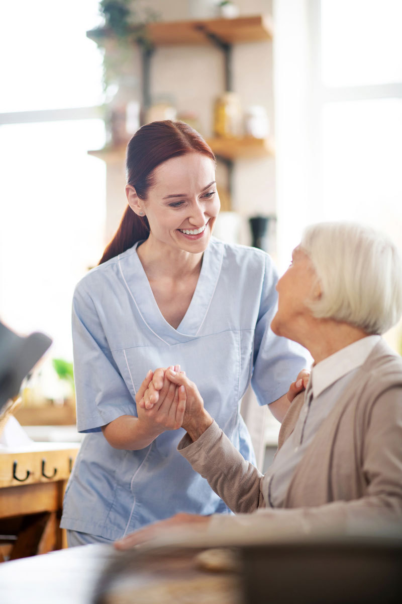 bigstock-Caregiver-Enjoying-Work-While--325354567